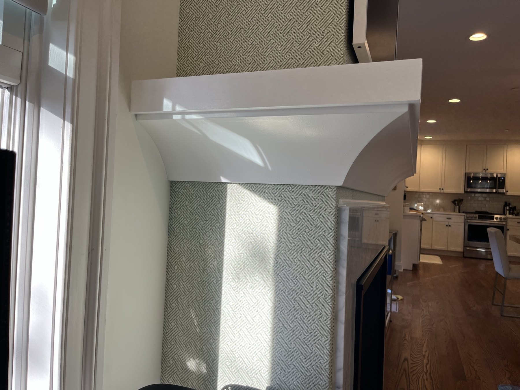 Close view of the painted mantel shelf and shaped support